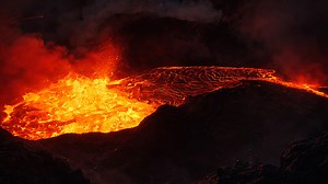 Glowing molten lava inside a volcanic basin