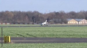 Business Private Corporate Executive Jet Departing Departure Take Off Taking Off at (Small Regional) Airport