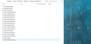 Change wallpaper for custom windows theme and save it?