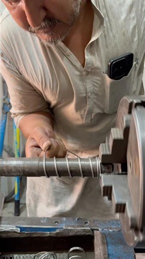 Simple Steel Wire Pressure Spring Making on Lathe Machine #shortsvideo #ytshorts