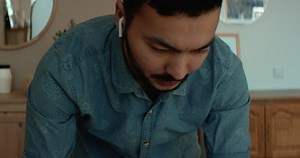 Portrait of Middle Eastern male remote working from home, having work video call. Stay home, quarantine remote work. Shot on RED Dragon