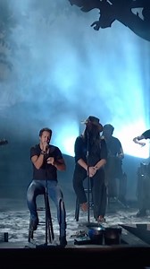 388K views · 26K reactions | “Drink a Beer” was debuted on the 2013 @CMA Awards alongside @chrisstapleton, who co-wrote the song and is featured on the track. During this performance Luke paid tribute to his late siblings, Kelly and Chris. It’s one of the most special songs to not only Luke and his family but to many of you at his shows as you raise a beer each night to someone you love. | Luke Bryan | Facebook