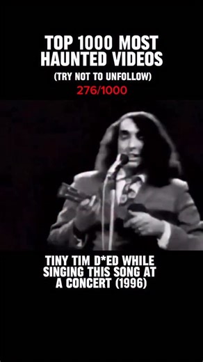 Haunted Footage on Instagram: "On November 30, 1996, Tiny Tim gave his final performance at a women’s club in Minneapolis before an audience of 500. Despite his frail health and his wife’s pleas not to perform, he stepped onto the stage determined to sing his signature tune, “Tiptoe Through the Tulips.” At first, the crowd smiled at the familiar sound—but his voice was different that night. Strained, trembling, yet hauntingly steady, as if held together by sheer willpower. Then, as he reached th