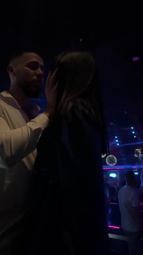 Intimate Nightclub Moments: A Romantic Encounter