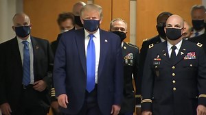 Trump wears a mask for first time in front of press pool