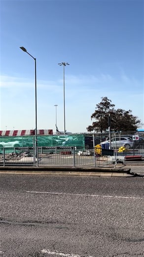 Emirates Boeing 777 push back from the gate at Stansted