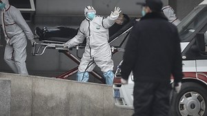 Outbreak of new virus explodes in China; human-to-human spread confirmed