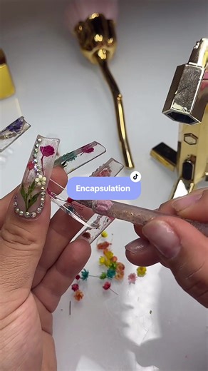 Can we encapsulate with gel x ? . The answer is YES! ✨ . . Pro Tips: -Always size up a full size or half a size ✨ -Use a thick gel for best results -Use top coat to seal the bottom of the nail before shaping ✨ . . . #nailsnailsnails #nailart #nailaddict #nailaddict #gelnails #encapsuladas #encapsulatednails #nailtech #smallbusiness #nailartist