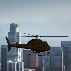 Can you stop the video exactly when this helicopter is in its place above the Los Angeles skyline? | DHL Express Pakistan