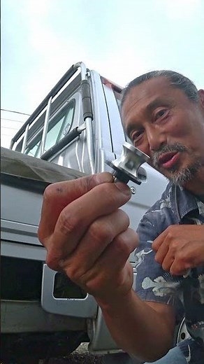 Light truck bed seat hook