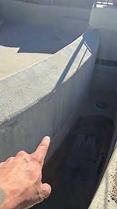 Inspecting pool interior for structural cracks