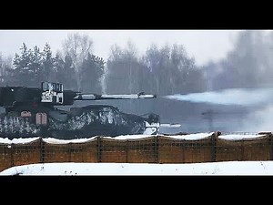 M1128 MOBILE GUN SYSTEM supporting infantry troops