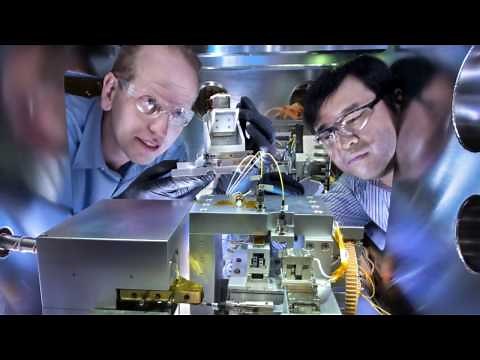 Hard X-ray Scanning Microscope with Multilayer Laue Lens Nanofocusing Optics