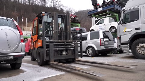 Skilled Technician Disassemble a Mercedes-Benz Car