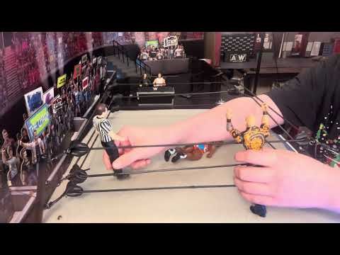Big E versus Baron Corbin in a WWE action figure match ￼
