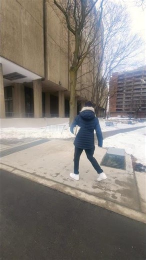 backwards walking man Toronto icon Ontario Canada