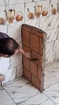 Craftsmanship: Red brick wall construction and wet-laid ceramic tiling.