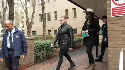 Russell Brand leaves court after pleading not guilty