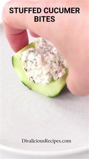 An easy stuffed cucumber recipe with cream cheese and walnuts. Add chopped ham, salmon or change the nuts! https://divaliciousrecipes.com/stuffed-cucumber-bites/ | Divalicious Recipes - Low Carb Recipes