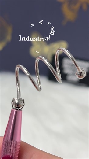 Stunning Triple Twist Industrial Barbell for Bold Piercings