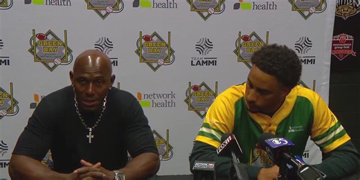 Donald Driver congratulates Bill Jartz on his retirement