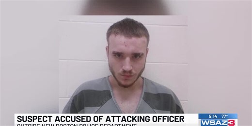 Officer attacked outside police department