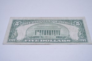 Five Dollar Bills With Red Serial Numbers
