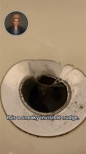 Why does water spiral differently down drains by hemisphere? #Shorts