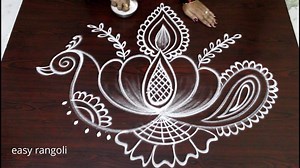 20K views · 528 reactions | Creative Freehand Peacock rangoli kolam designs | Easyrangoli suneetha | Facebook
