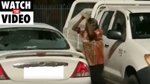 Video: Woman caught blatantly smashing car windows