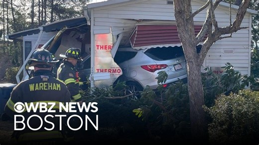 Car crashes into Massachusetts trailer home