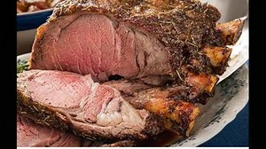 Prime Rib Roast over Lump Charcoal with Cucumber, Lettuce, Orange,...