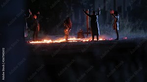 Dark ritual at night. Satanic prayer performing for Devil