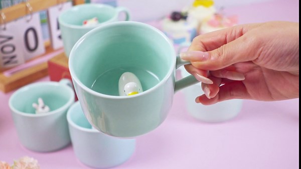 Uiifan 7 Pcs Cute Animal Inside Cup Bulk 8 oz Valentine's Day Cup Gift Kids Hot Cocoa Mugs Ceramic 3D Coffee Mug Panda Cat Polar Bear Dolphin Bunny Duck Kitten Mugs Cartoon Figurine Teacup, 7 Design