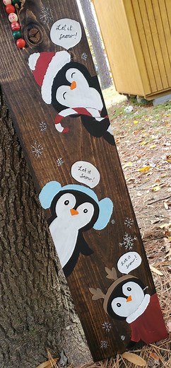 Painting my Christmas penguin sign from a few years back 🐧❤️🌲 have a beautiful Wednesday y'all! #RusticChristmas #christmasdecor #porchleaner #handpainted #welcomesign #porchdecor #letitsnow | Love Crafted Decor