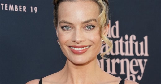 Margot Robbie stops traffic in daring thigh-split gown at the New York premiere of A Big Bold Beautiful Journey