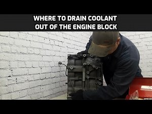 Where is the coolant drain bolt on the engine block?