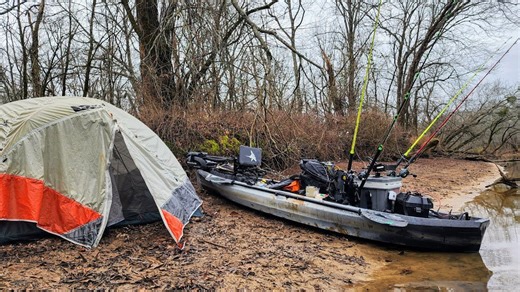 Kayak camping on a small river