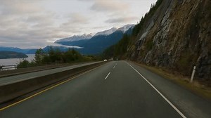 clip-1100564031-driving-on-sea-sky-highway-between-squamish
