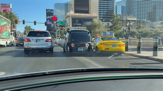 Zoox gets stuck, Tesla FSD Assists:Yesterday I was driving to the Cosmopolitan on the Las Vegas Strip where I came across an indecisive Zoox that had to reverse to fix its mistake. Tesla FSD v14.3.2 came & helped out by backing up automatically to give it roomGreat clip 🙂