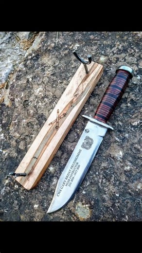 The KA-BAR knife's history centers on its iconic adoption by the U.S. Marine Corps during World War II in late 1942, becoming a legendary multi-purpose fighting and utility tool with its distinctive stacked leather handle and 7-inch blade, though its name comes from an older 1920s story about a hunter killing a bear, with the Union Cutlery Company officially adopting the brand name KA-BAR in 1924 and later officially changing their company name to KA-BAR in 1952. It served Marines, Army, Navy, a