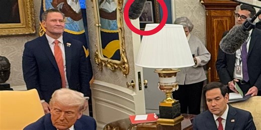 Trump's mugshot is framed just outside the Oval Office