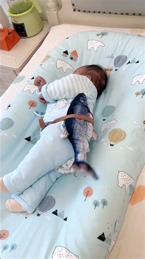 Cute Baby playing with Toy fish 🐟