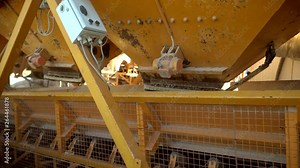 Preparing ingridients for concrete. Mixing cement, sand and water in correct ratio for strong concrete from big containers.