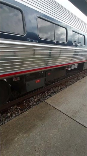 Boarding an Amtrack train. Mardi Gras Line