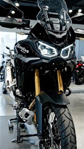 bike name.New Honda Africa Twin 650 2026 black bike.Slowly slowly indicator on off front view.