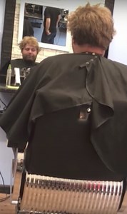 Bald prankster gets one over his barber with fake wig