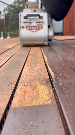 PROBLEM: Flaking and peeling deck due to multiple layers of the incorrect product (varnish) being applied to this beautiful Merbau hardwood timber deck. SOLUTION: Sanding back to bare and using a high quality penetrating oil like Woca Denmark instead! We start with 40grit on THE BIG MACHINE and 36grit with THE EDGER. We then move on to hand scraping all the corners before finishing off the edges with the orbital sander using 50grit. We then apply 2 coats of exterior wood oil to bring the deck ba