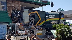 Rubbish truck crashes into Brisbane shop