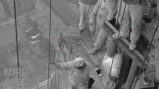 Construction workers help build the Chrysler Building in 1930